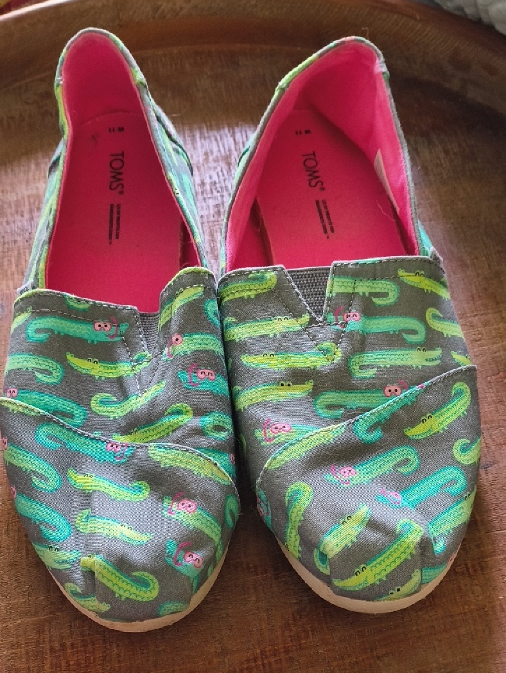TOMS Canvas Slip-Ons with Green Alligator Print and Hot Pink Lining